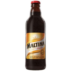 Maltina drink in a dark, short bottle with the Maltina wrapper around the bottle and a red aluminium seal cap